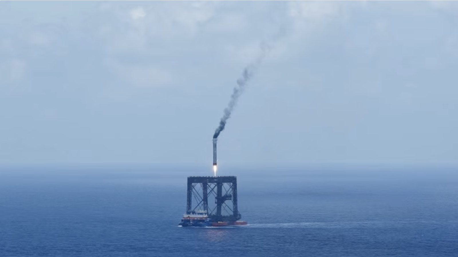 The Long March 10B first stage descending toward the recovery vessel Linghang Zhe's net capture system after its debut launch from Hainan