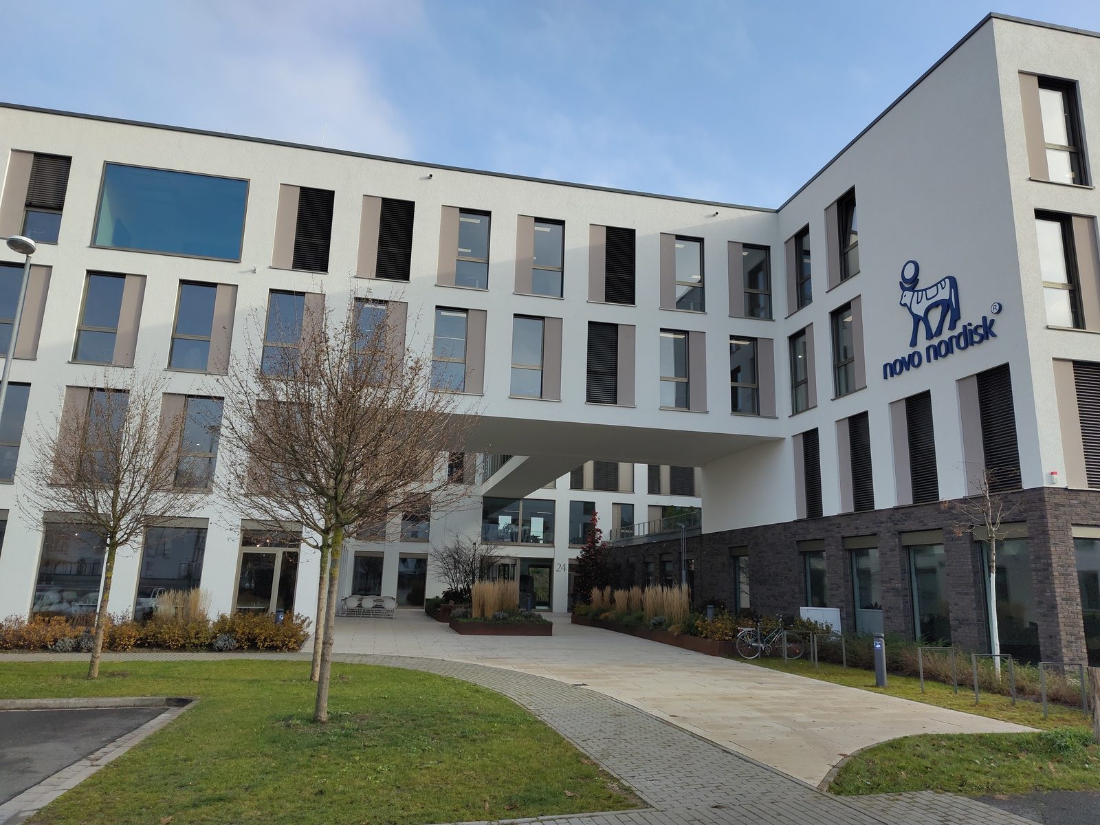 A Novo Nordisk corporate building exterior with the company name on the facade