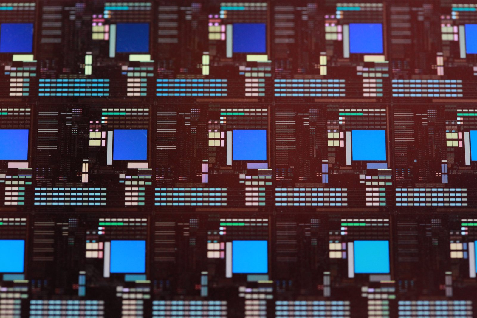 Finished semiconductor chips on a silicon wafer, partly diced for packaging