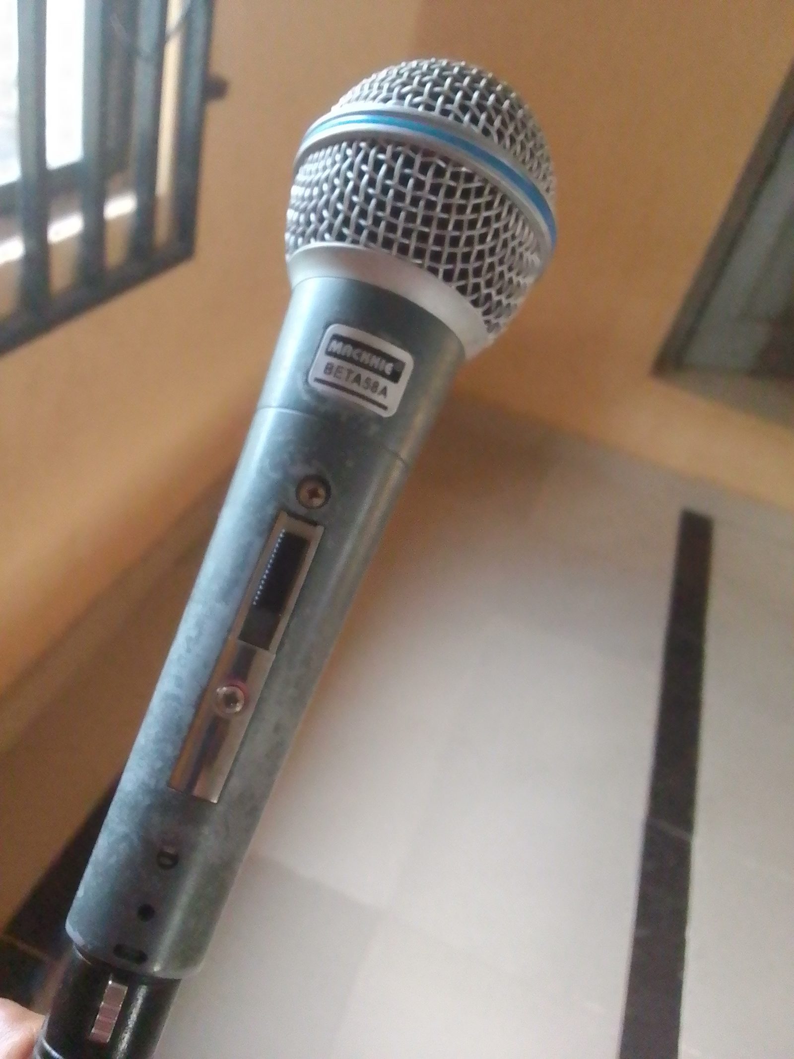 A studio microphone in close-up.