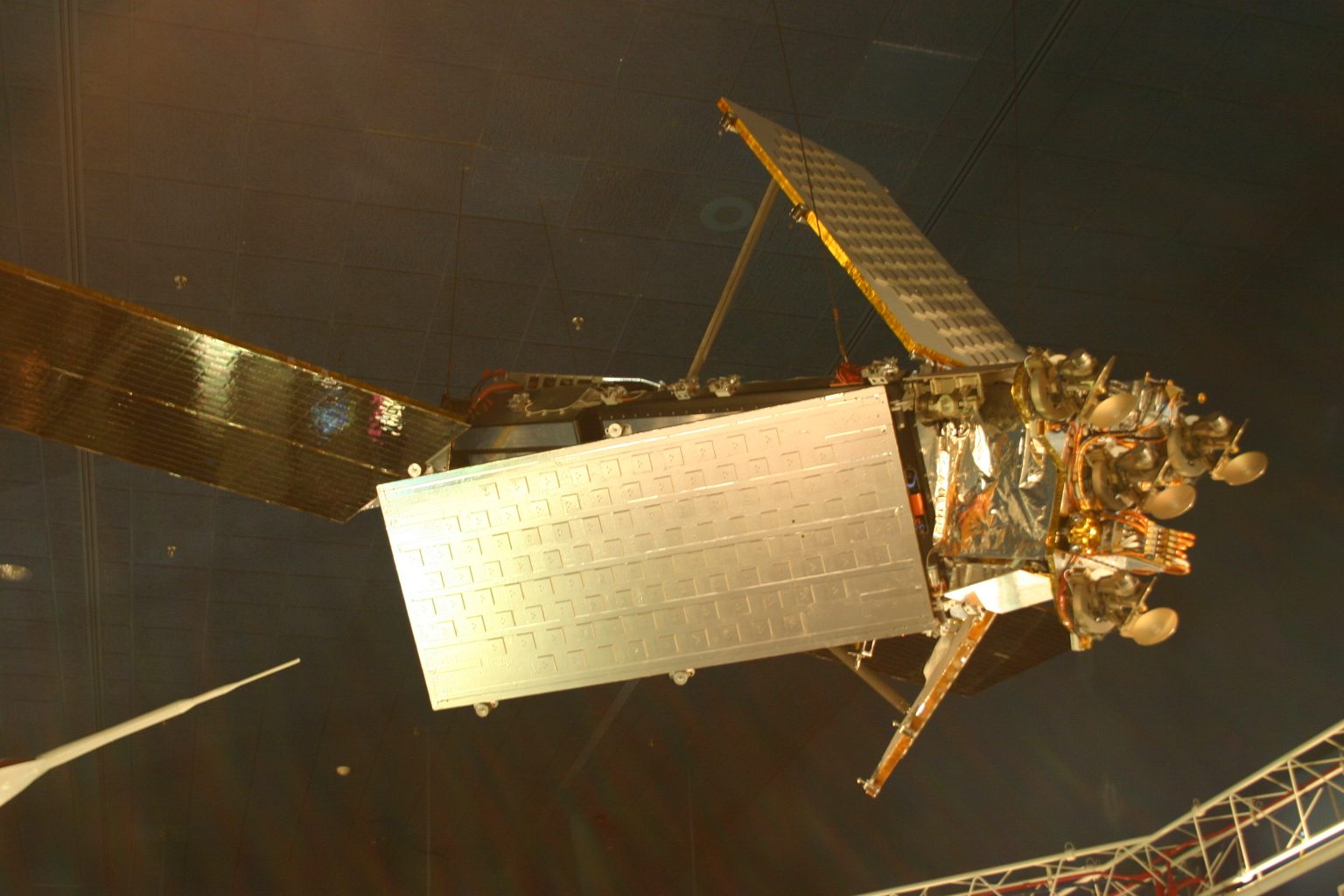 An Iridium low-Earth-orbit communications satellite against black space