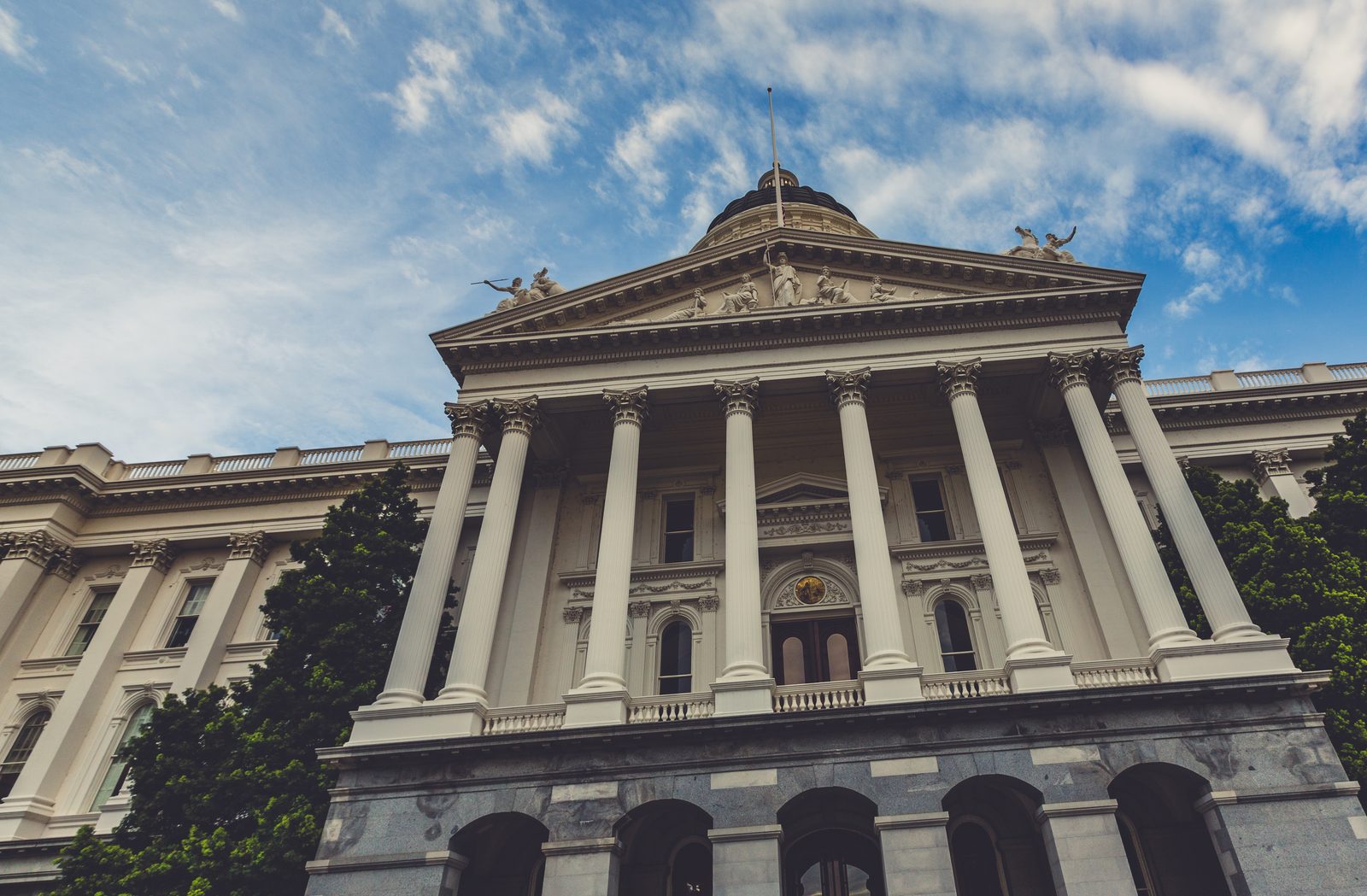 The California State Capitol building in Sacramento, where lawmakers are advancing the No Robo Bosses Act and new chatbot rules.