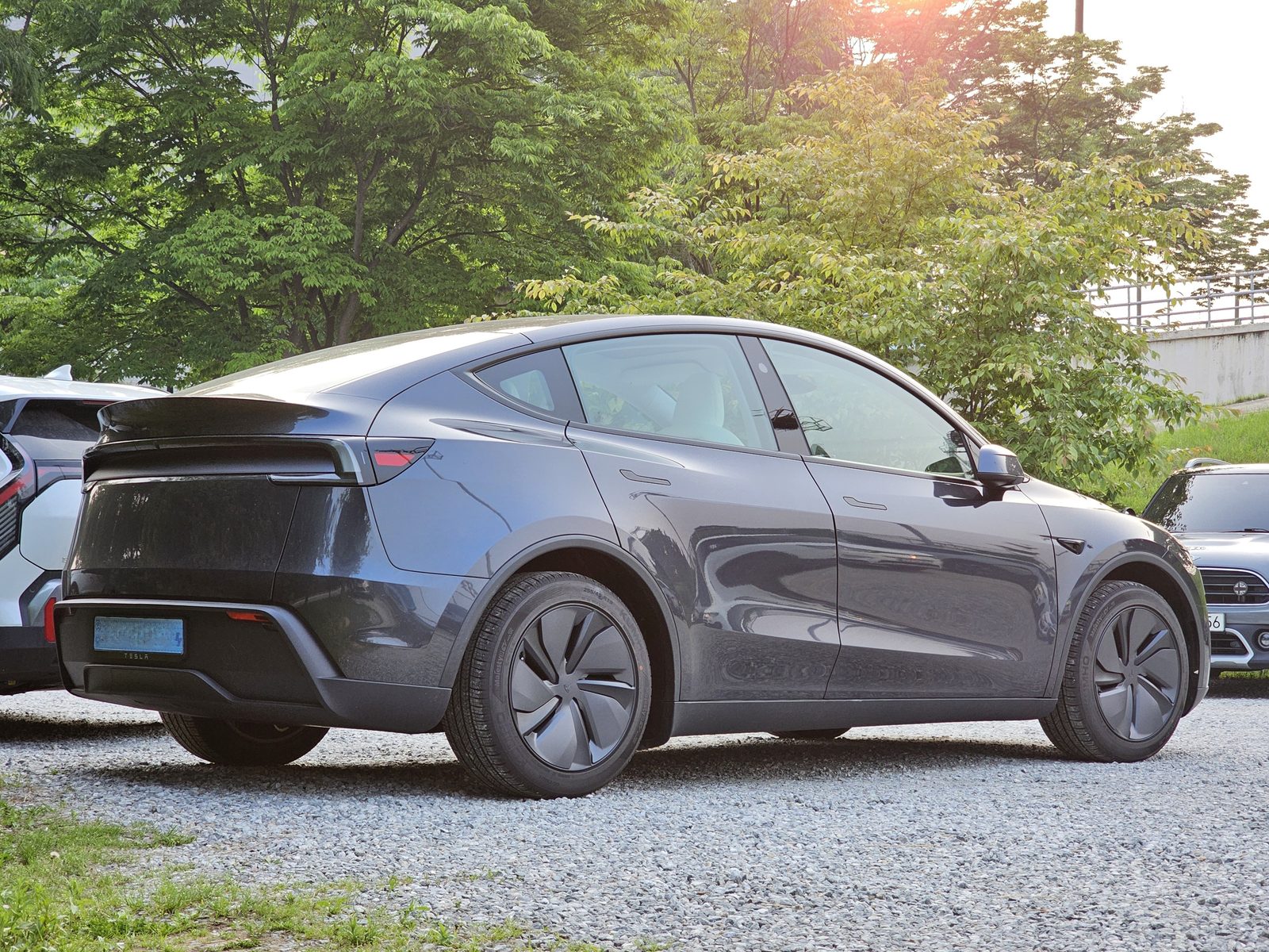 A 2025 Tesla Model Y (Juniper) in stealth grey.